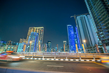 Dubai Marina night skyline from the bridge, United Arab Emirates