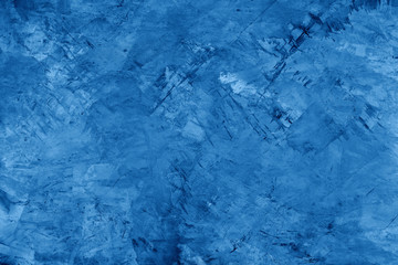 Blue concrete background.