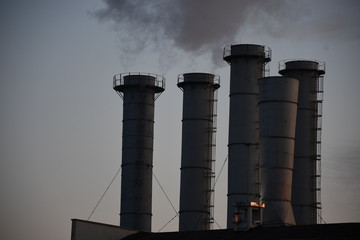 smoke from chimney on background of sky