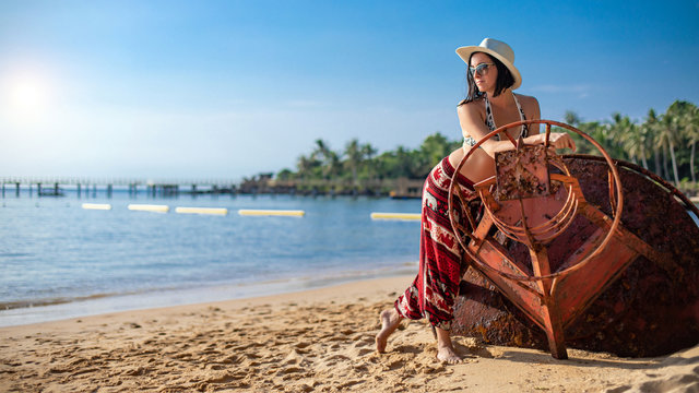 Young woman on a tropical beach. Phu Quoc island, Vietnam.