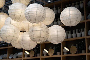 Many paper lanterns. Lighted paper lanterns inside of building, decoration © woff