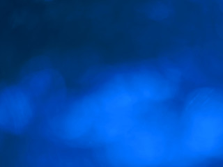 blue glitter sparkle isolated on black background. color 2020
