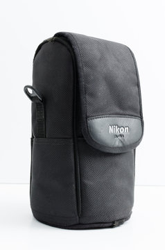 london, england, 05/05/2018 A black nikon lens protector and carry case for nikon glass lenses. strong material equipment protection for photographers on the move. waterproof camera gear.