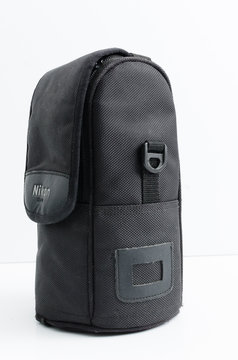 london, england, 05/05/2018 A black nikon lens protector and carry case for nikon glass lenses. strong material equipment protection for photographers on the move. waterproof camera gear.
