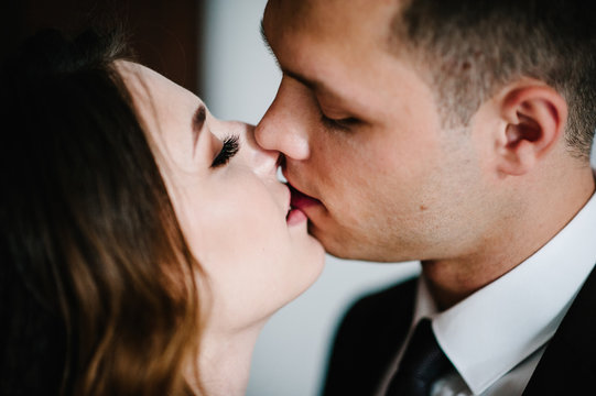 Young couple kissing on Valentine's day. Close up. love. Romantic photo.