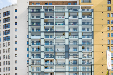 Glass balcony exterior. Modern condominium building.  
