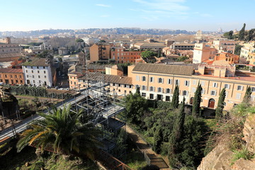 Fototapeta na wymiar Classic Rome - aerial view to old roof buildings and street