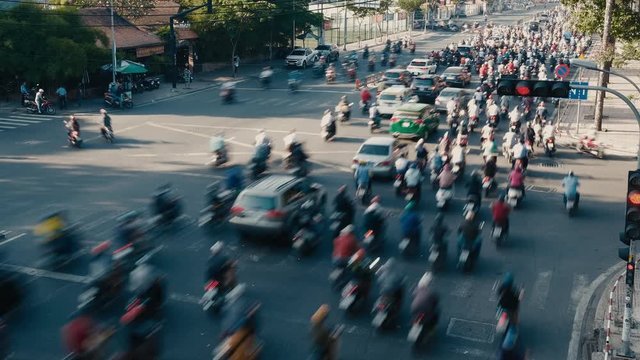 Stock 4k. Time lapse or timelapse traffic from morning to night in Ho Chi Minh city, Vietnam. Multiple scenes time lapse footage of people, life, traffic from day to evening in the financial district