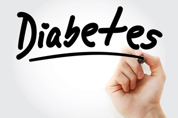Diabetes text with marker, health concept background