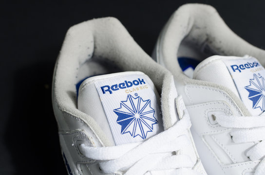 london, england, 05/05/2018 Reebok classic Workout plus Hipster unisex Stone Trainer Size UK 9 on a black stdio background. retro vintage british made shoes.