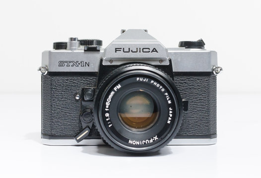 london, england, 05/05/2018 A Retro vintage FUJICA STX 1N 35mm single lens reflex film camera,and 50mm 1.8 lens. vintage hipster camera making a fashionable come back in youth culture.