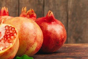 Group of pomegranate fruits close up background