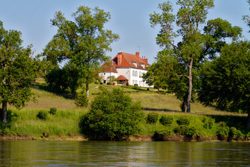 Fototapeta na wymiar Lone house on the banks of the Allier River in France