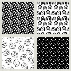 Set of abstract organic seamless patterns. Black and white textures, vector