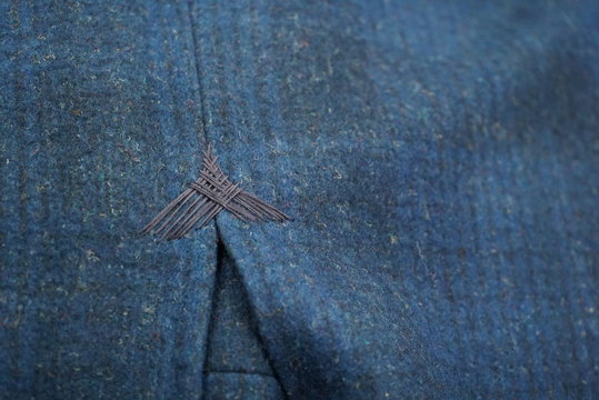 Handmade detail on a tailored jacket