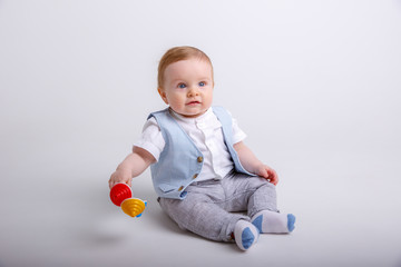 Fototapeta na wymiar toddler with toy isolated on white background