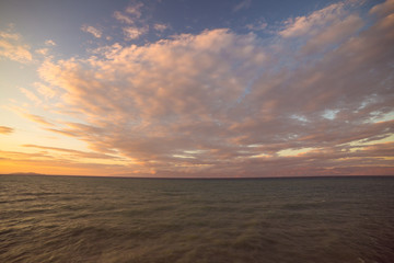 Sunset landscape on the beach at the sea