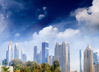 Fototapeta premium Dubai panoramic skyline and buildings at sunset