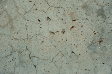 Abstract background. Old rough texture, gray concrete wall with cracks. Structure, background.