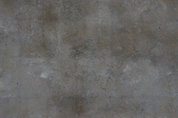 Abstract background. Smooth concrete wall with spots of various shades of gray. Structure, background.