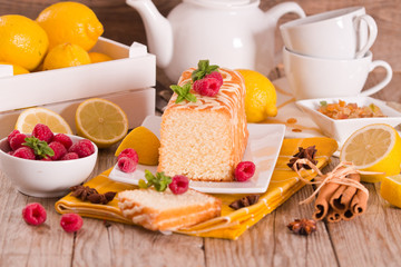 Lemon sponge cake with pomegranate.	