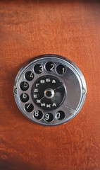 old dialer on wooden background