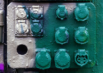 vandalized electrical equipment in abandoned industrial area