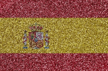 Spain flag depicted on many small shiny sequins. Colorful festival background for party