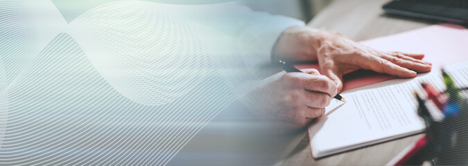 Businessman signing a document (lorem ipsum text used; panoramic banner