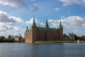 Fototapeta na wymiar Frederiksborg Castle in Denmark Viewed From the Gardens