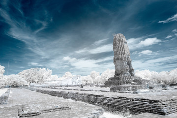 Ruined ancient Buddhist temple and pagoda in infrared photography