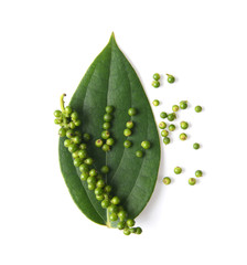 peppercorns with leaf isolated on a white background. top view