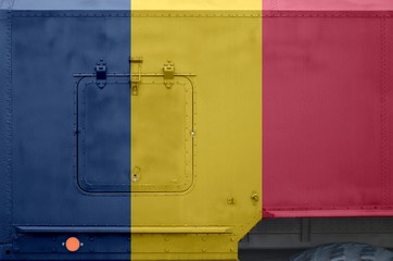 Chad flag depicted on side part of military armored truck closeup. Army forces conceptual background