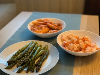 Shrimps and asparagus in a plate 