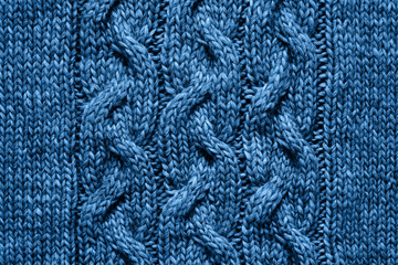 Blue knitted texture. Handmade Knitwear. Background