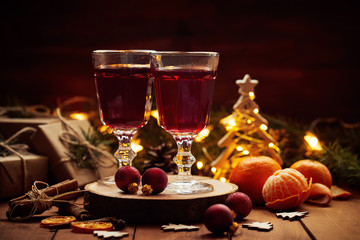 Hot fruit tea on christmas table with decoration