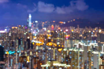 Blurred abstract background lights, beautiful cityscape view of Hong Kong city skyline at night in Hong Kong.