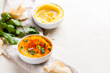 Set of vegetarian Middle Eastern Arabian eggplant,sweet potato and beet dip baba ganoush or mutabbal on a white background with copy space.Lebanese food appetizer from baked vegetable and tahini
