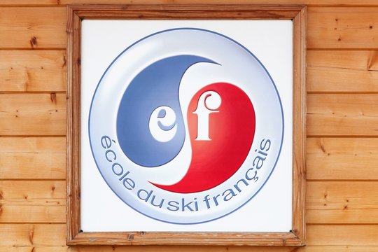 Meaudre, France - June 23, 2017: French ski school logo on a wall called ecole de ski francais or ESF in french. ESF Is a consortium of 250 French ski schools with 17,000 instructors