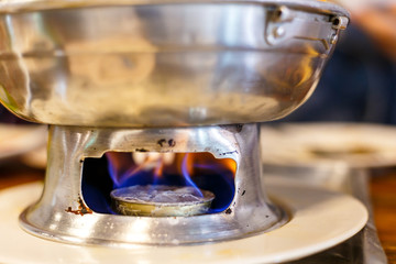 Dry Alcohol for warming food at the table in restaurant.