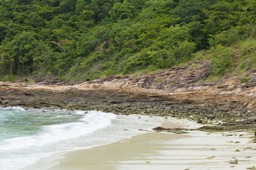 Stones and rocks on the coastline of the ocean after an outflow