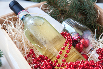 Fototapeta na wymiar white wine with a red ribbon