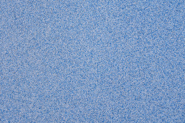 Obraz premium Blue background texture from marble chips. Plaster texture. Speckled colorful natural background.