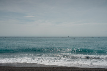 brighr blue sea and cloudy sky