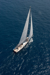 Sailing aerial. Saling boat. Superyacht. Palma Cup. Palma de Mallorca. Spain. Mediterranean Sea. Boating. Helicopter view.