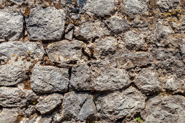 background of an old stone wall in Perast, Montenegro
