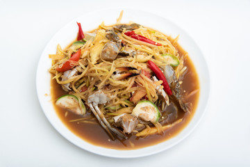Papaya Salad with Salted Crab and Fermented Fish on white background.