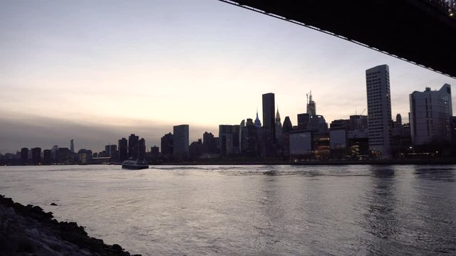 NEW YORK CITY, USA - NOVEMBER 30, 2019 : Manhattan skyline view from Queensbridge park in the evening