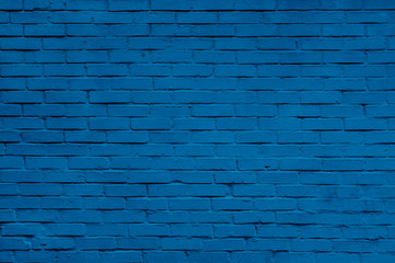 Classic blue brick wall texture close up. Top view. Modern brick wall wallpaper design for web or graphic art projects.
