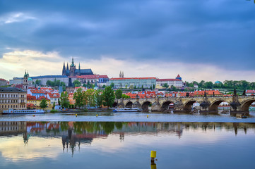 A view of Prague Castle and the Charles Bridge across the Vltava River in Prague, Czech Republic.